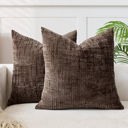 Housse de coussin 60x60 Tissage Naturel café sur canapé blanc